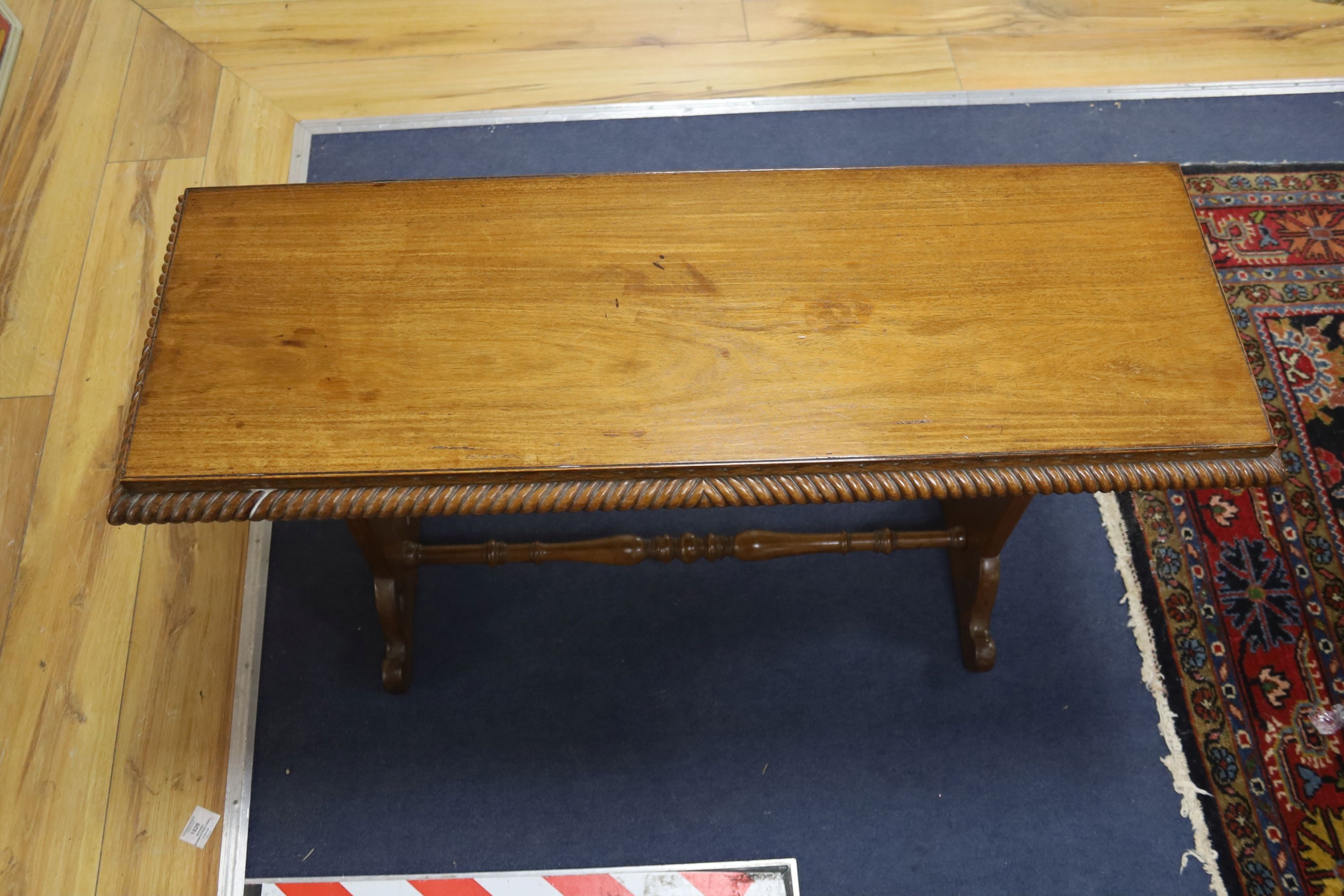 An early 19th century walnut window seat, length 95cm, depth 34cm, height 56cm